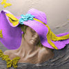 Fototapete Skulptur Frau violett Hut Schmetterlinge M5284