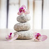 Wall mural orchids and white stones - SPA M0959